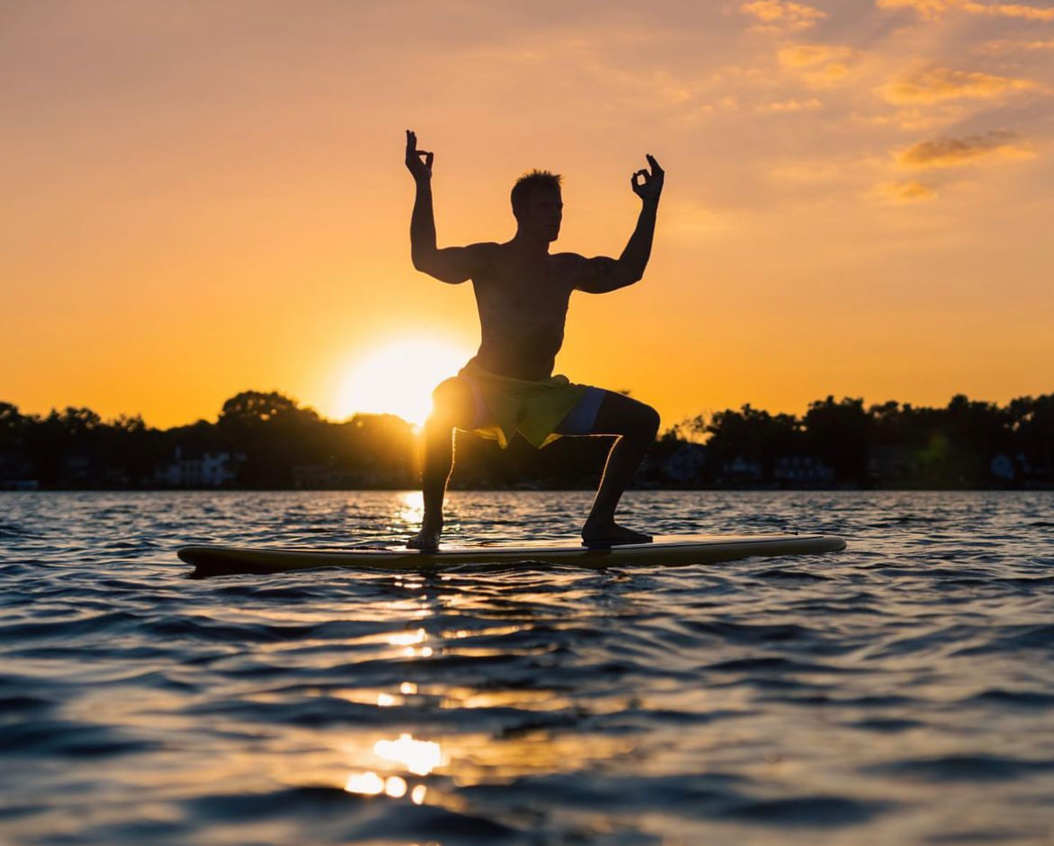 yoga on a stand up paddle board