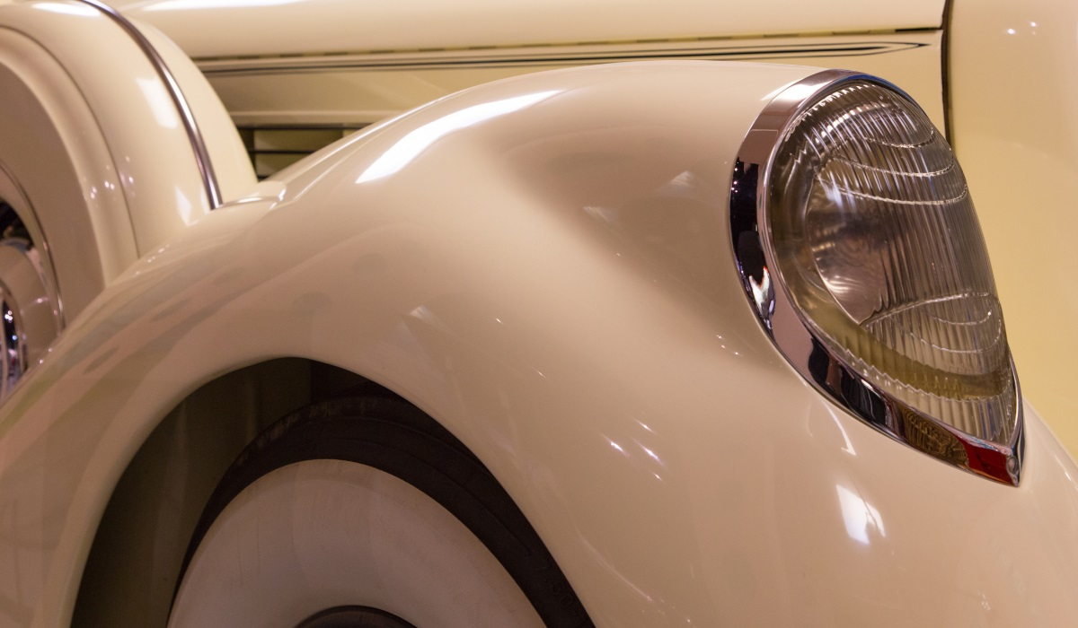 1930s luxury car headlight and wing close-up