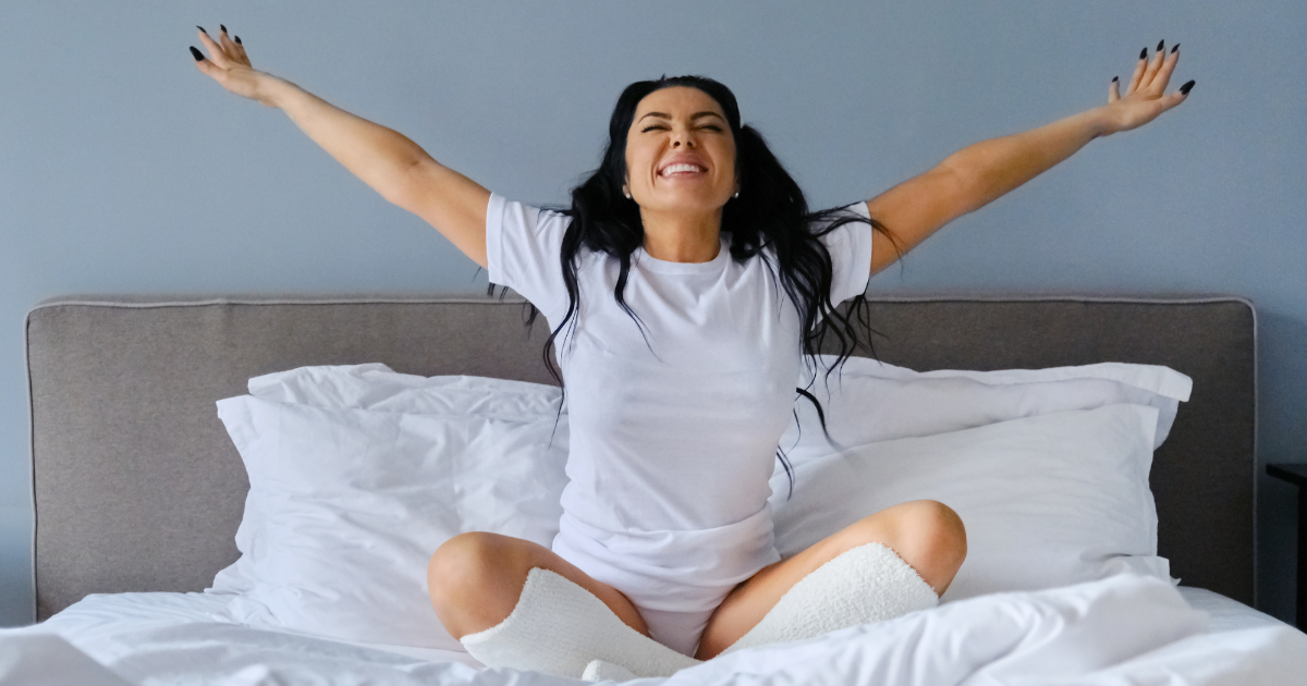 Woman waking up feeling refreshed