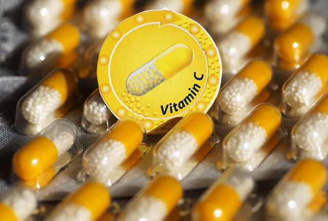 vitamin c capsules with a yellow sticker label.