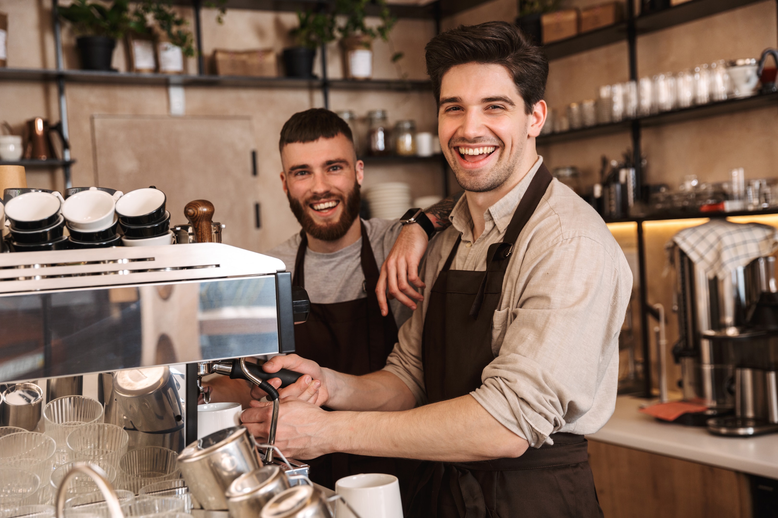 2 baristas at a coffee shop