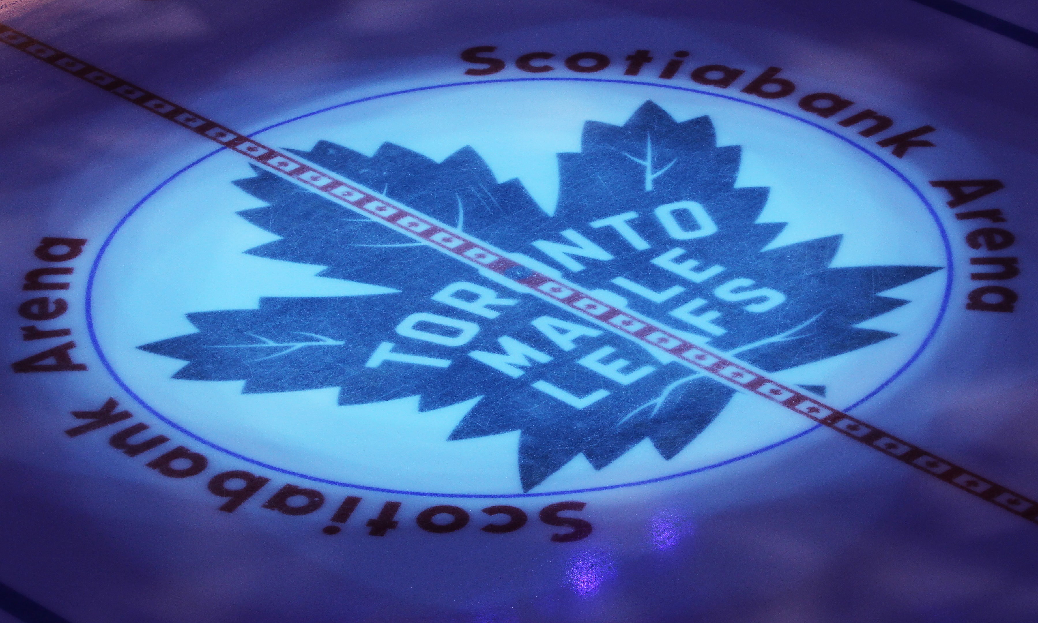 A view of the Toronto Maple Leafs Logo on the ice in an NHL game at Scotiabank Arena on March 6, 2024 in Toronto, Ontario, Canada.