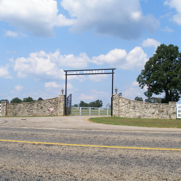 An image showing a modern ranch gate with advanced access control features.