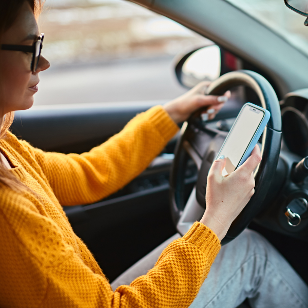 An image showing a car accident caused by distracted driving.