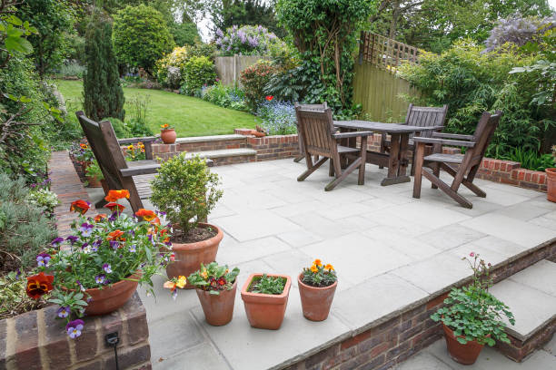 Backyard Patio with stone pavers and brick walls