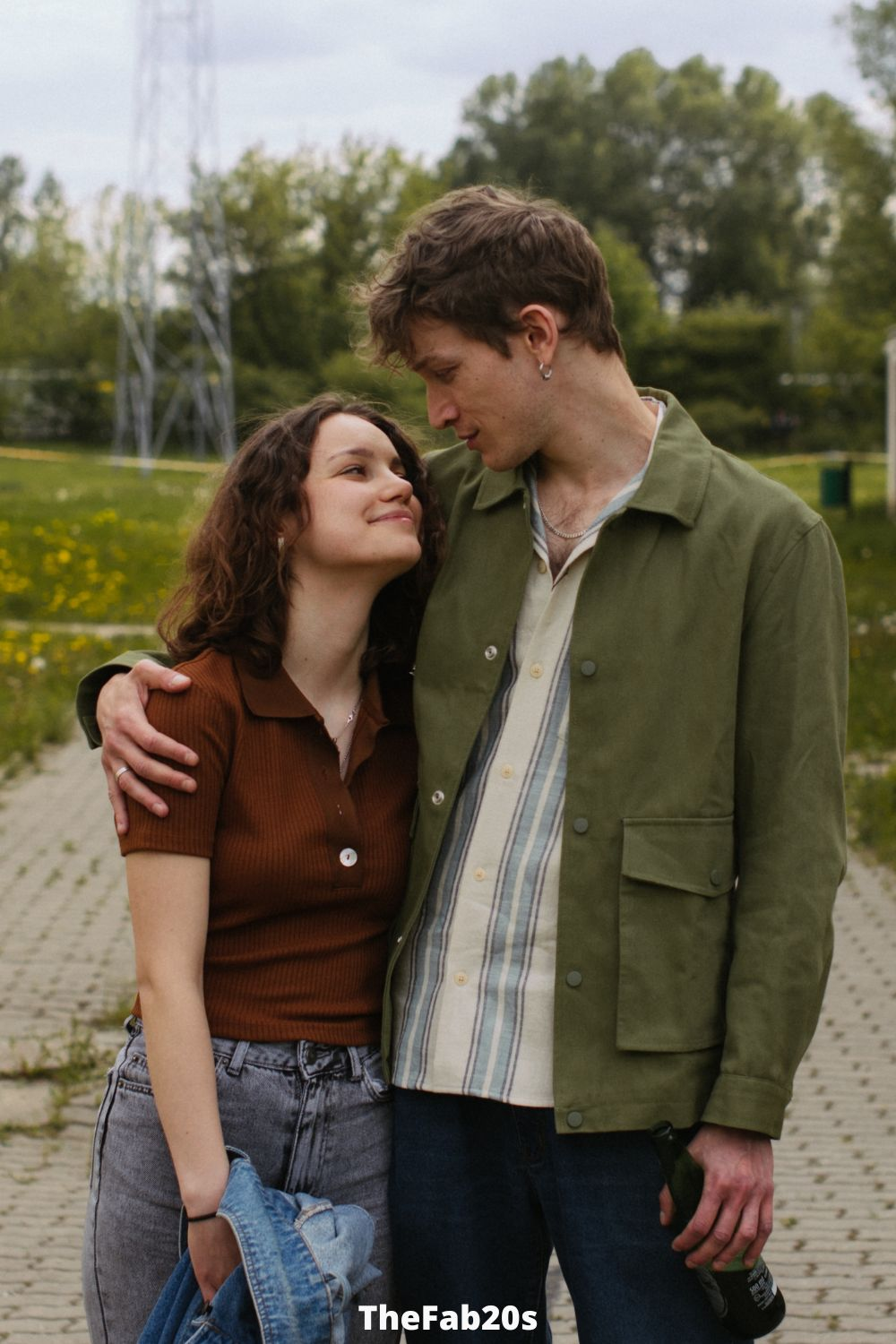 Man and woman looking at each other fondly - Featured in Signs He Regrets Sleeping With You