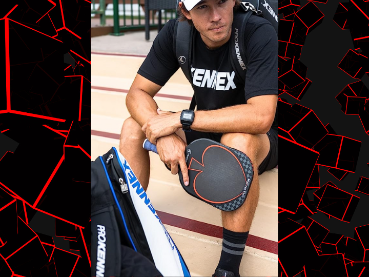 An image showing one of the best edgeless pickleball paddles, the ProKennex Black Ace Pro, in the hands of a male pickleball player.