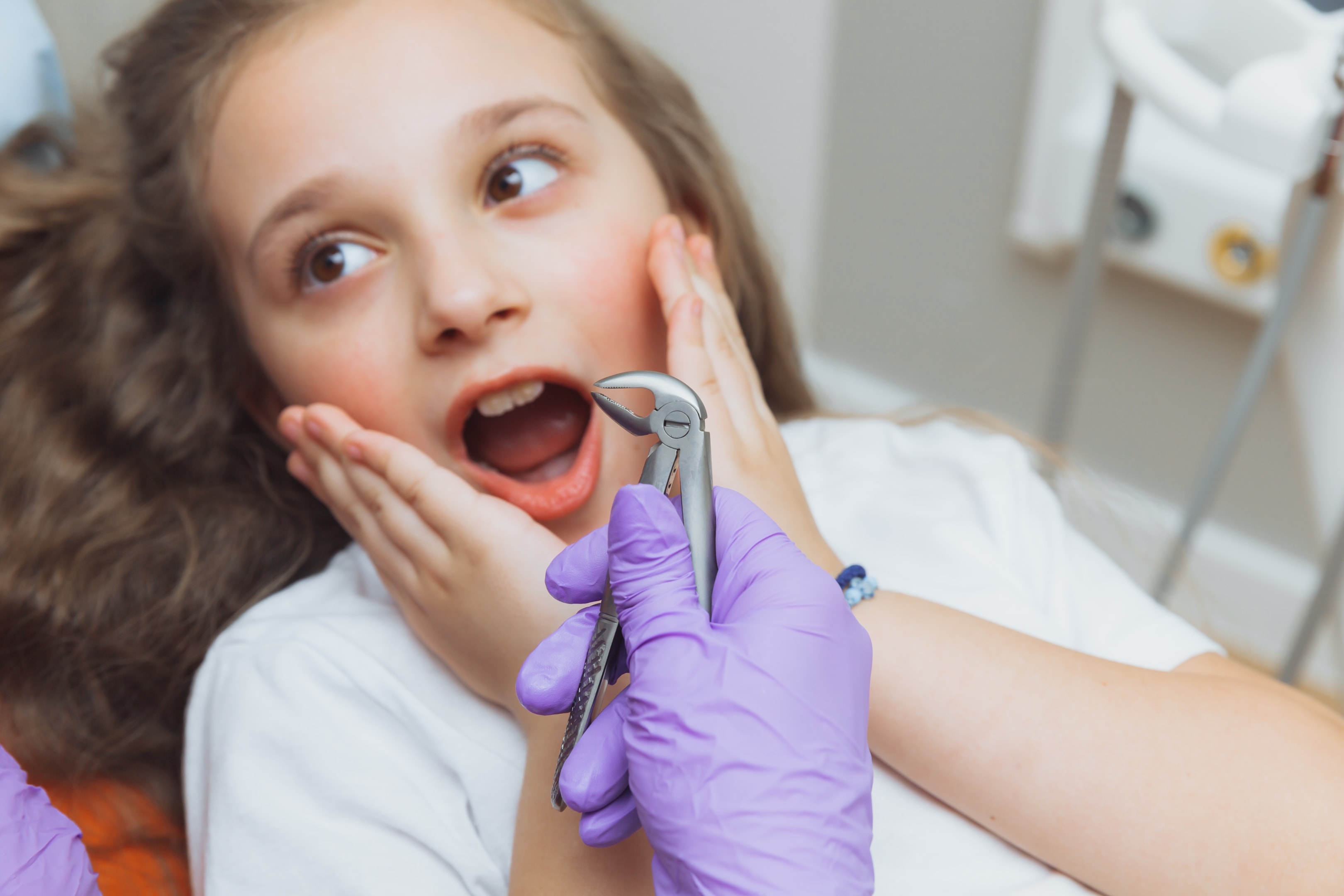 A photo of a girl scheduled for tooth extraction today.