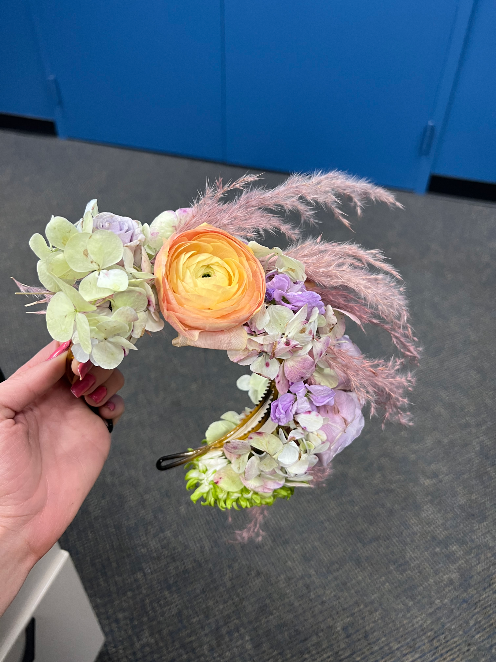 Derby hats comes in all shapes and sizes. Love this fascinator made of real flowers. This would be perfect for weddings or showers as well.