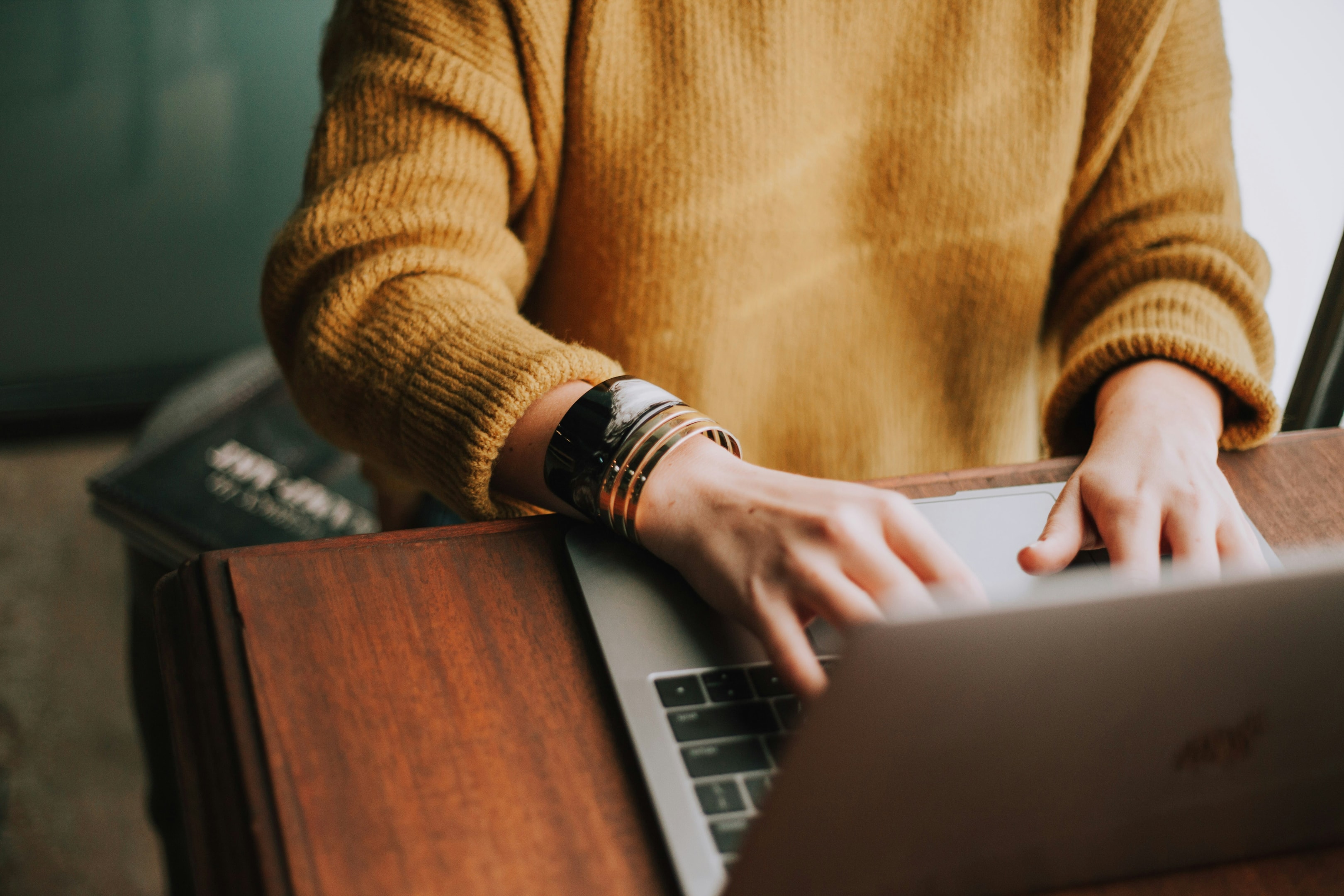 Real estate investor researches property valuation using various online tools.