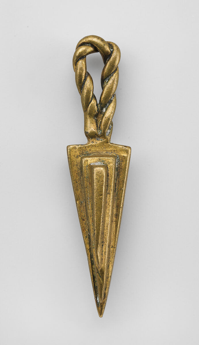 Cast from clay slip, Akan gold weights like the amulet pictured above were used in trade.