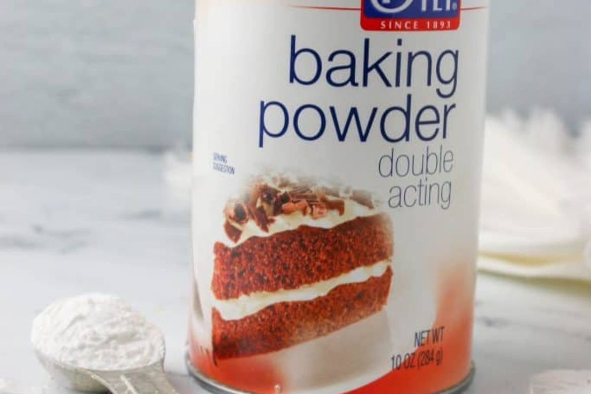 can of baking powder and a measuring spoon