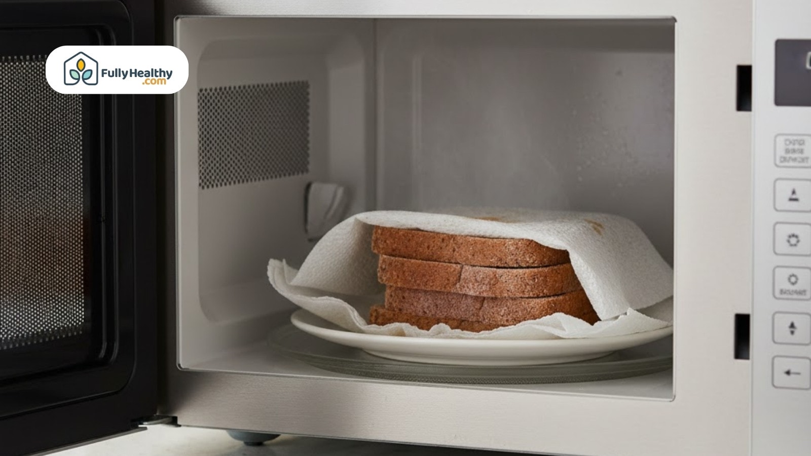 Slices of bread warming on plate inside microwave with paper towel
