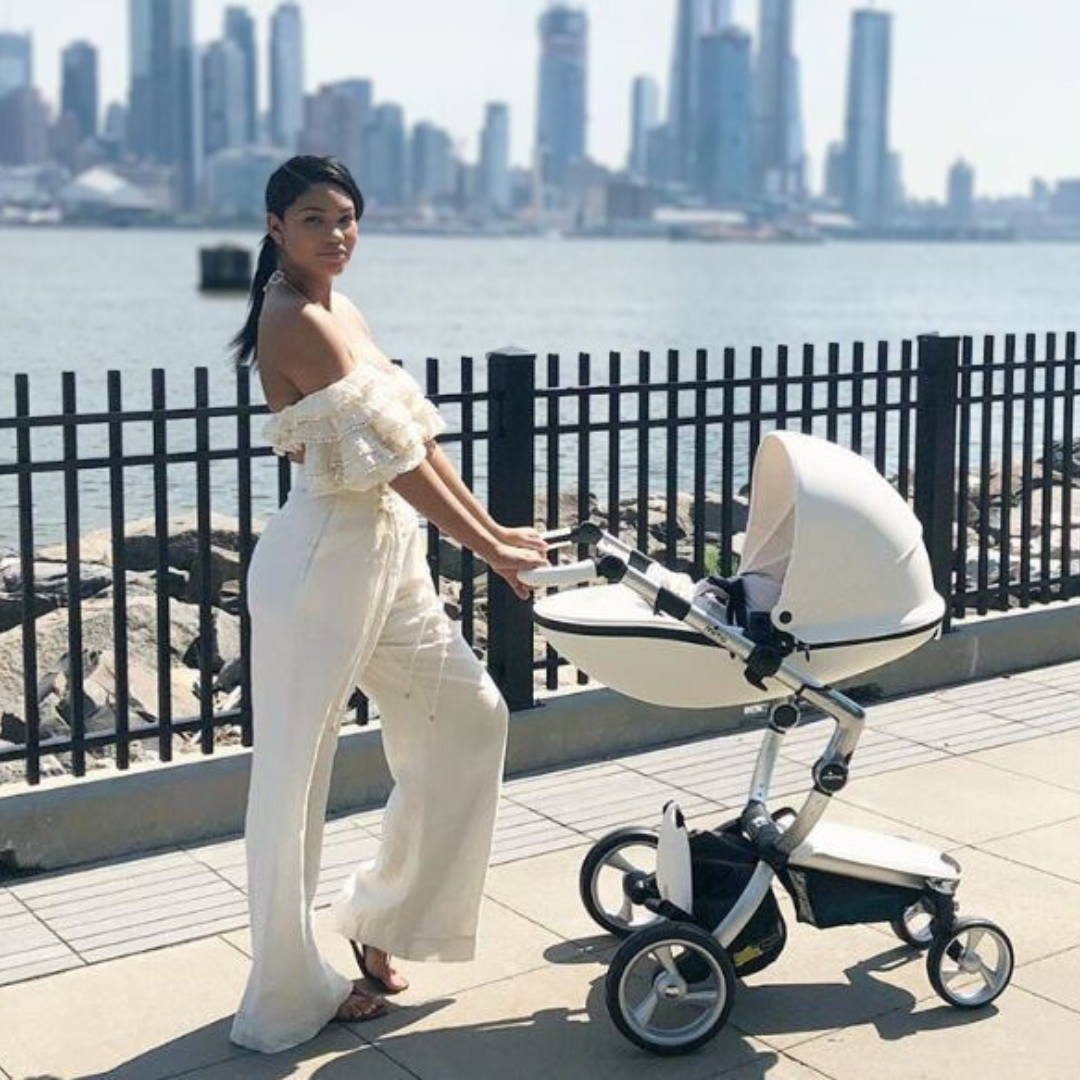 Chanel Iman uses Mima Xari Signature stroller in white for her newborn in 2018
