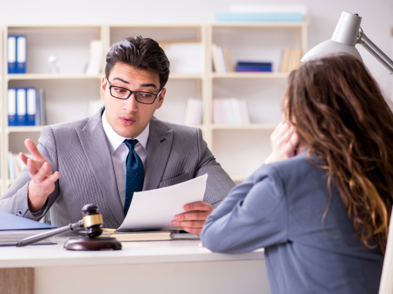 Image showing a person consulting with a lawyer. 