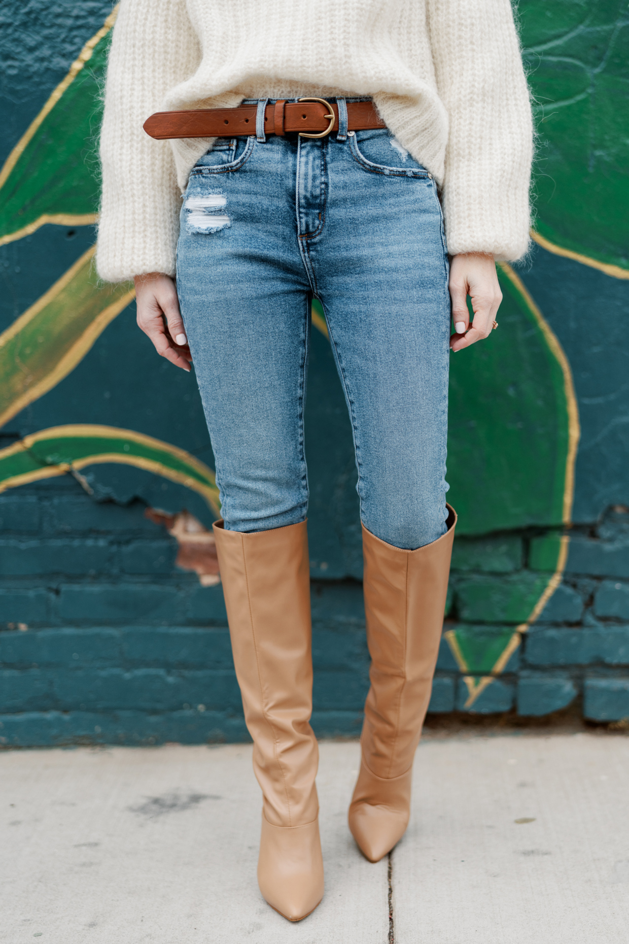 Knee-high boots with your favorite straight-leg jeans