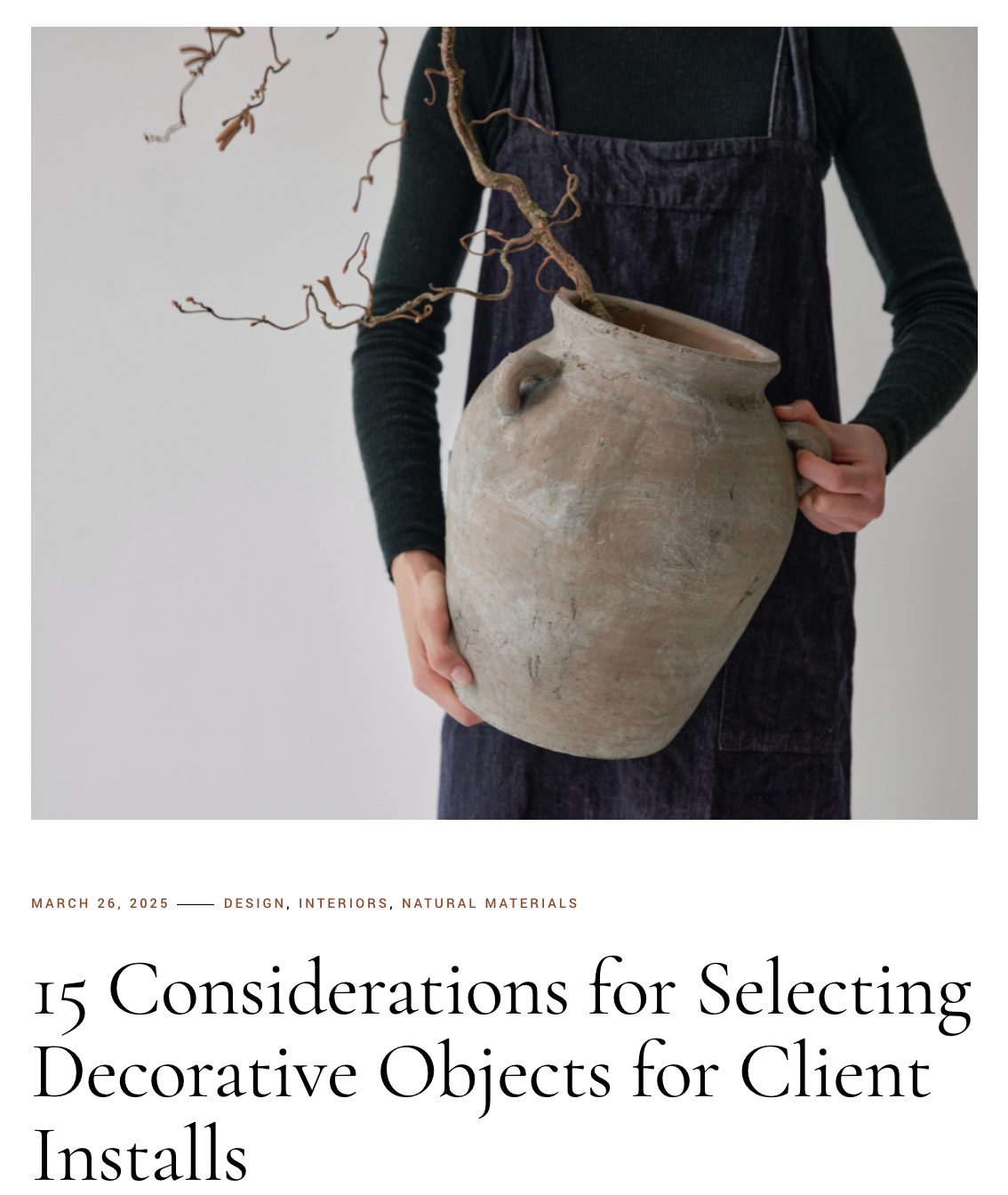 a woman holding a pot in her hands