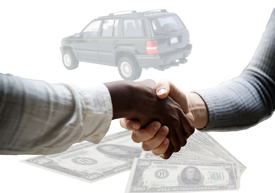 A person negotiating with a junk car buyer