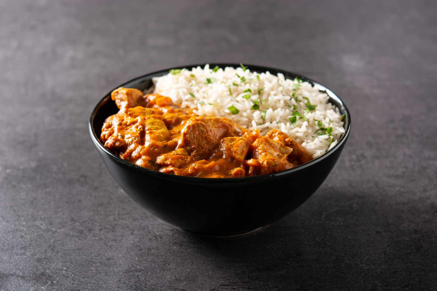 Raj's Corner - Chicken Korma: Delicious Indian dish with tender chicken in creamy sauce. 
