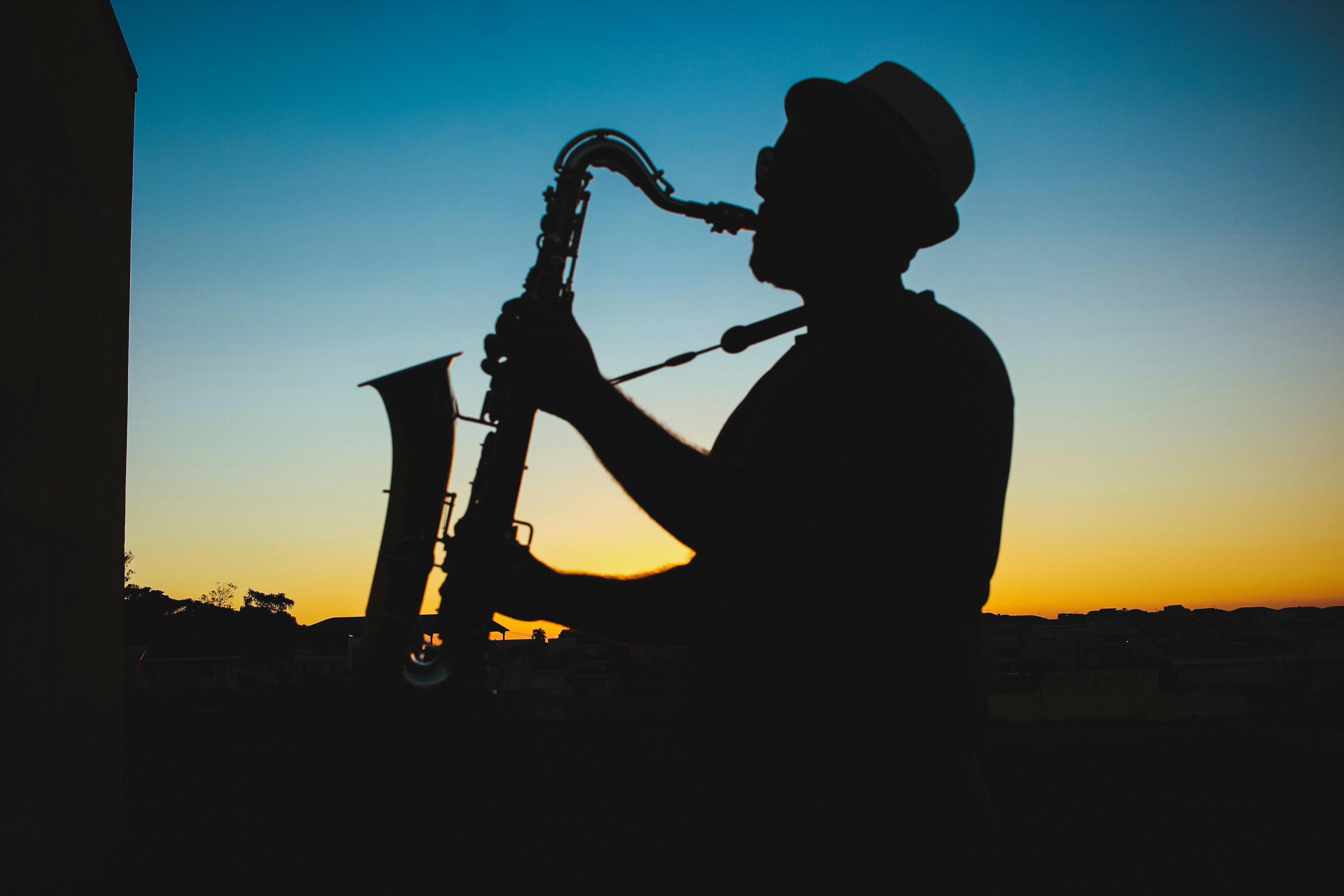 https://www.pexels.com/photo/silhouette-of-a-man-playing-saxophone-during-sunset-733767/