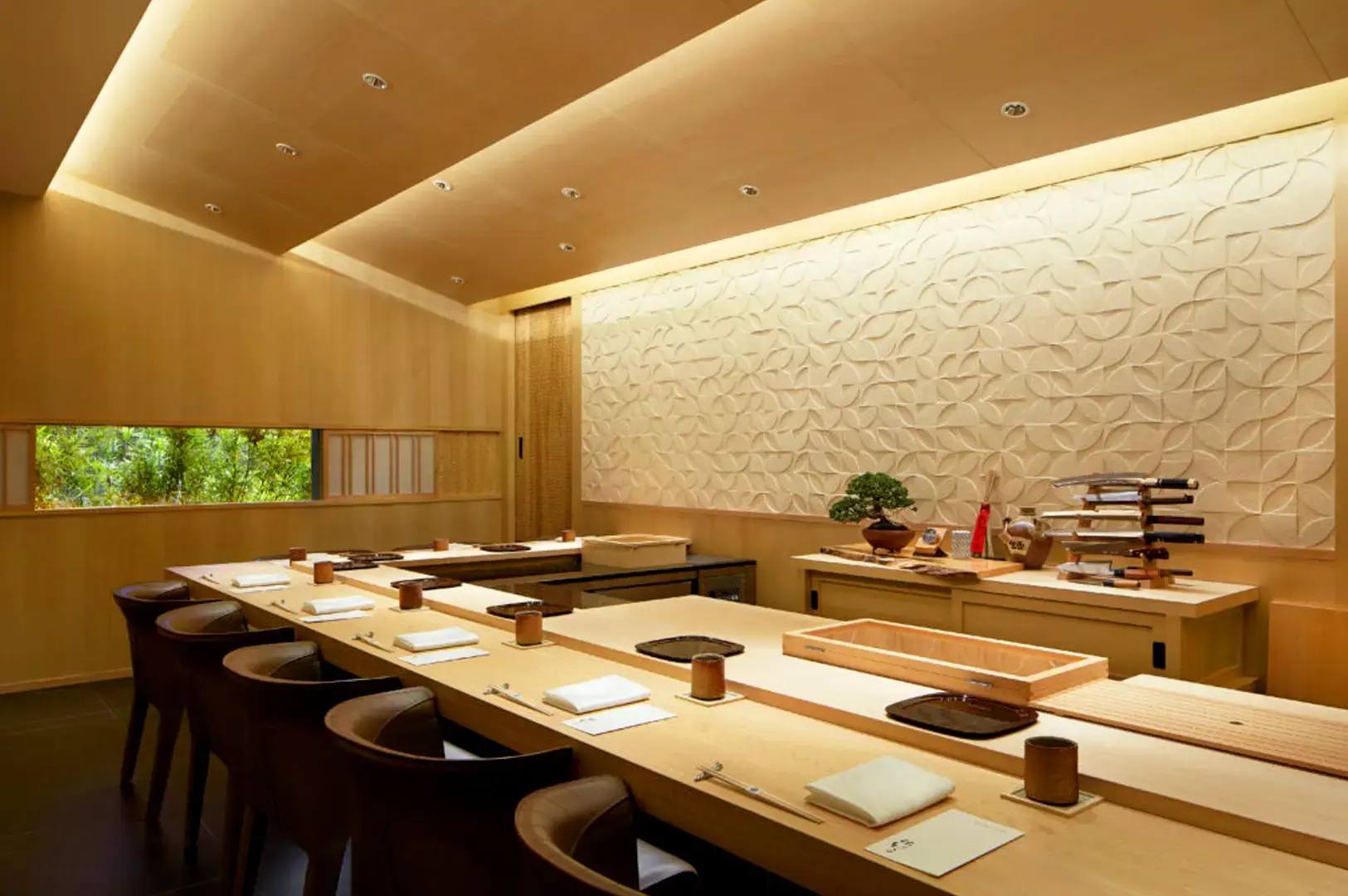 Sushi Sato Singapore elegant Japanese sushi restaurant interior with traditional wooden counter and refined dining décor