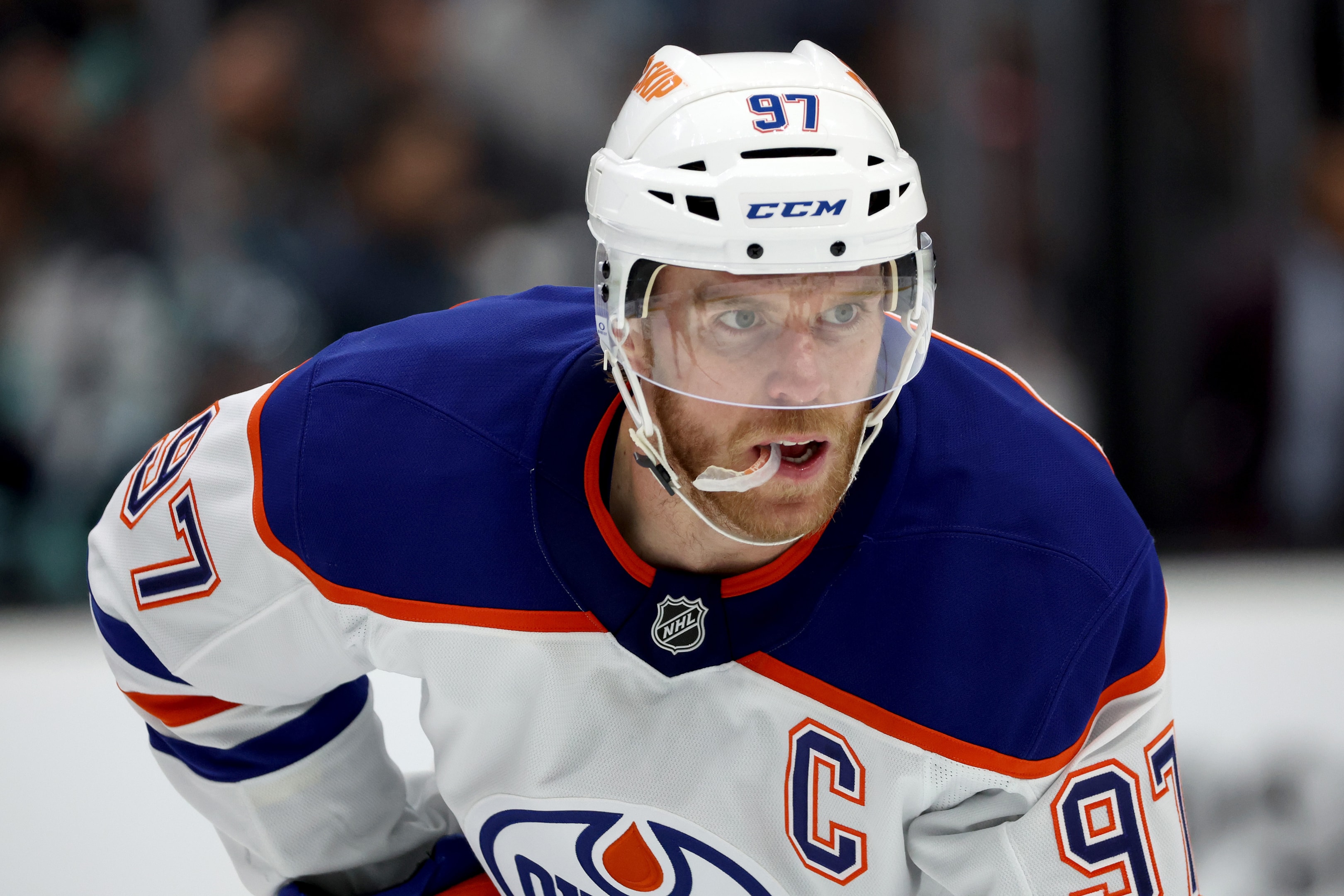 Connor McDavid of the Edmonton Oilers looks on against the Seattle Kraken during a pre-season game on October 02, 2024 in Seattle, Washington. 