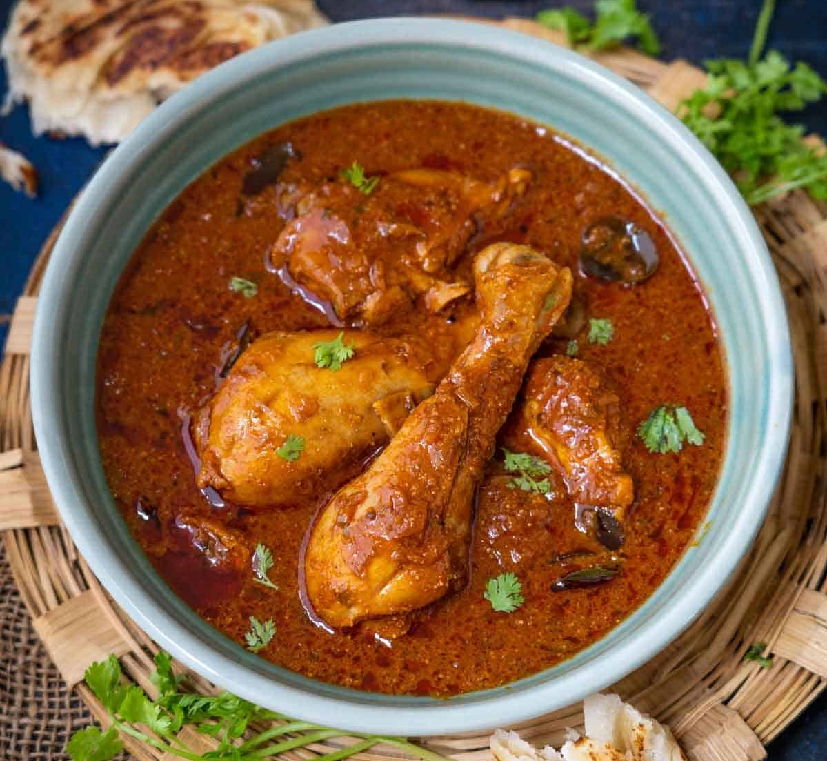Andhra Chicken Curry: A flavourful dish representing authentic Andhra cuisine.