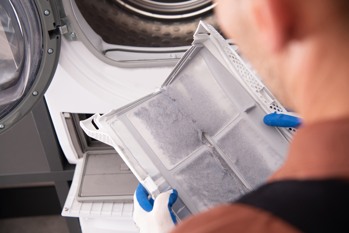 A washing machine with cushion covers inside and mild detergent