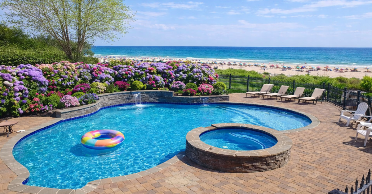 Luxury Jersey Shore vacation home with private pool, spa, hydrangea landscaping, and ocean views overlooking the beach.