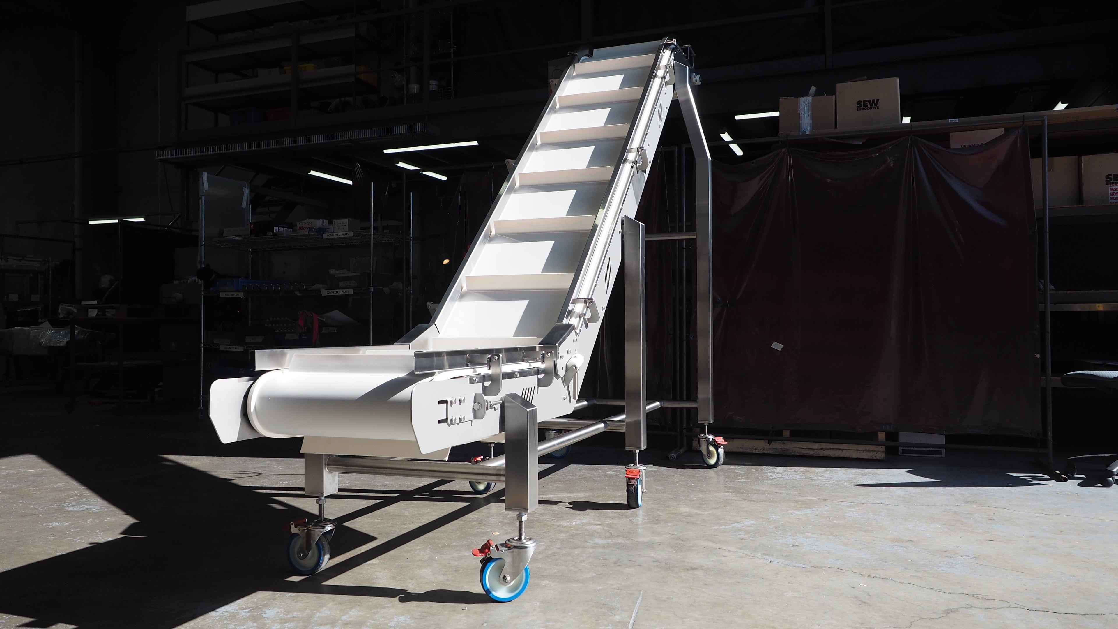 This image showcases a Jarlam bucket elevator, built to meet the demanding hygiene and performance requirements of the food industry.