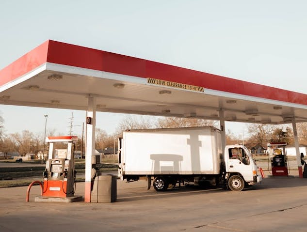 A truck in a gas station; Fuel Management for your entire fleet is another important aspect of cost reduction