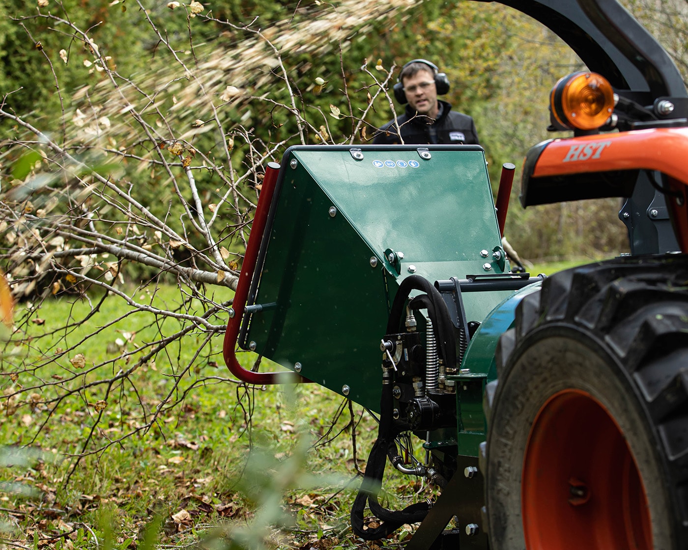 A Woodland Mills WC68 Wood Chipper getting rid of tree branches. 