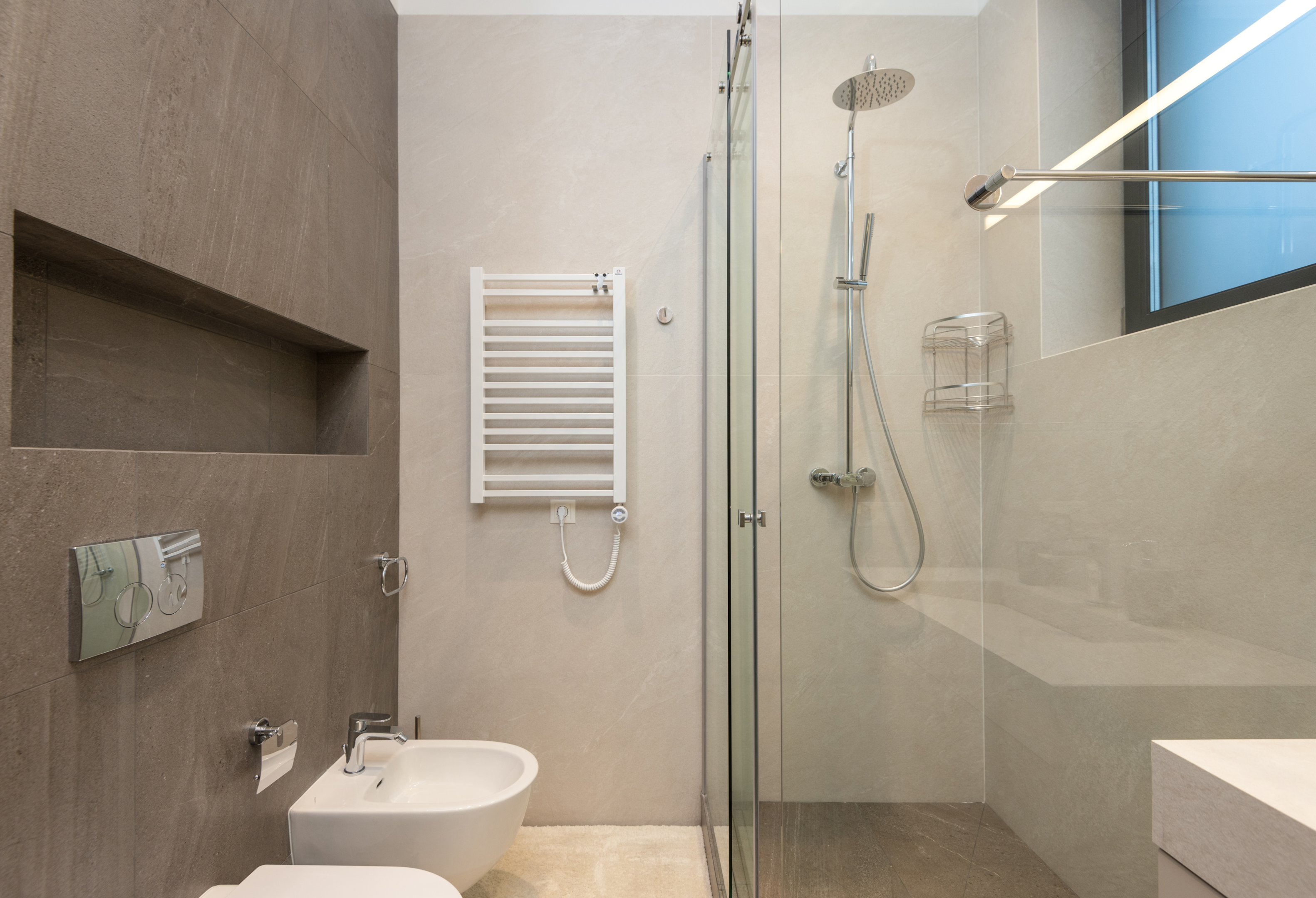 bathroom with a glass shower and overhead shower