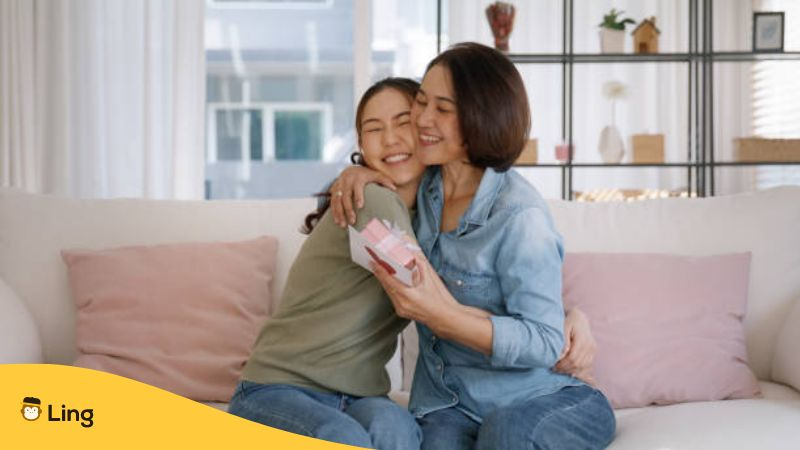 A woman hugging her mother