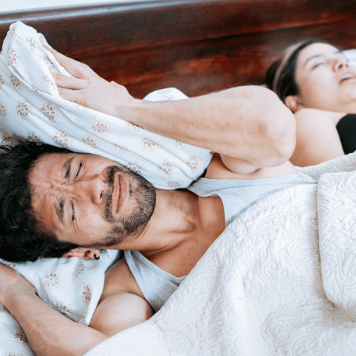 person snoring loudly