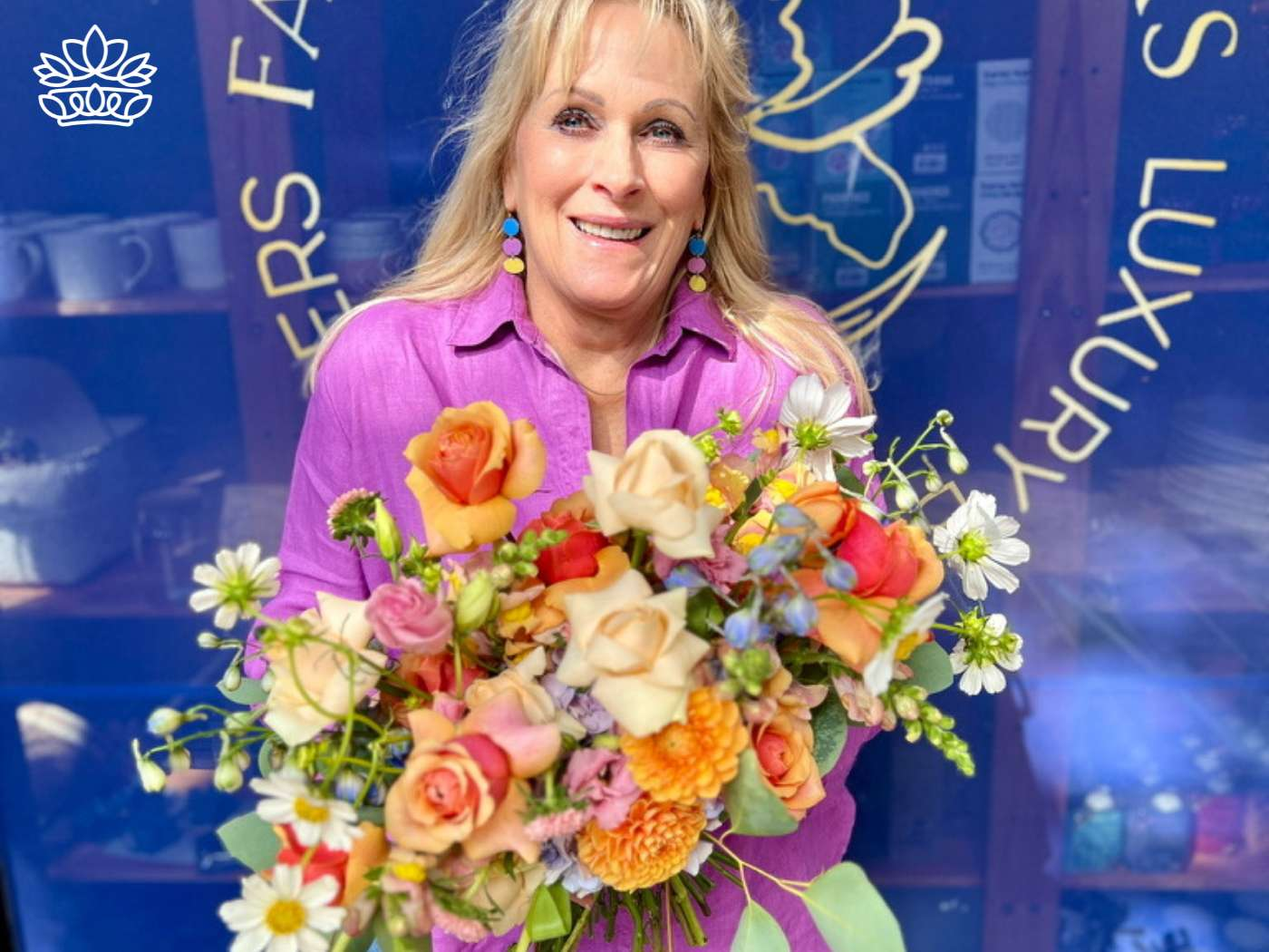 Happy woman presenting a bouquet from the Eid Flowers Collection, conveying Eid Mubarak wishes for Eid Al-Fitr and Eid Al-Adha celebrations, embodying the joy of Eid ul-Fitr, offered by Fabulous Flowers and Gifts.