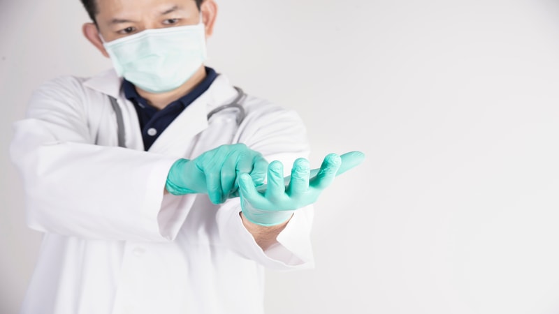 Doctor wearing nitrile gloves