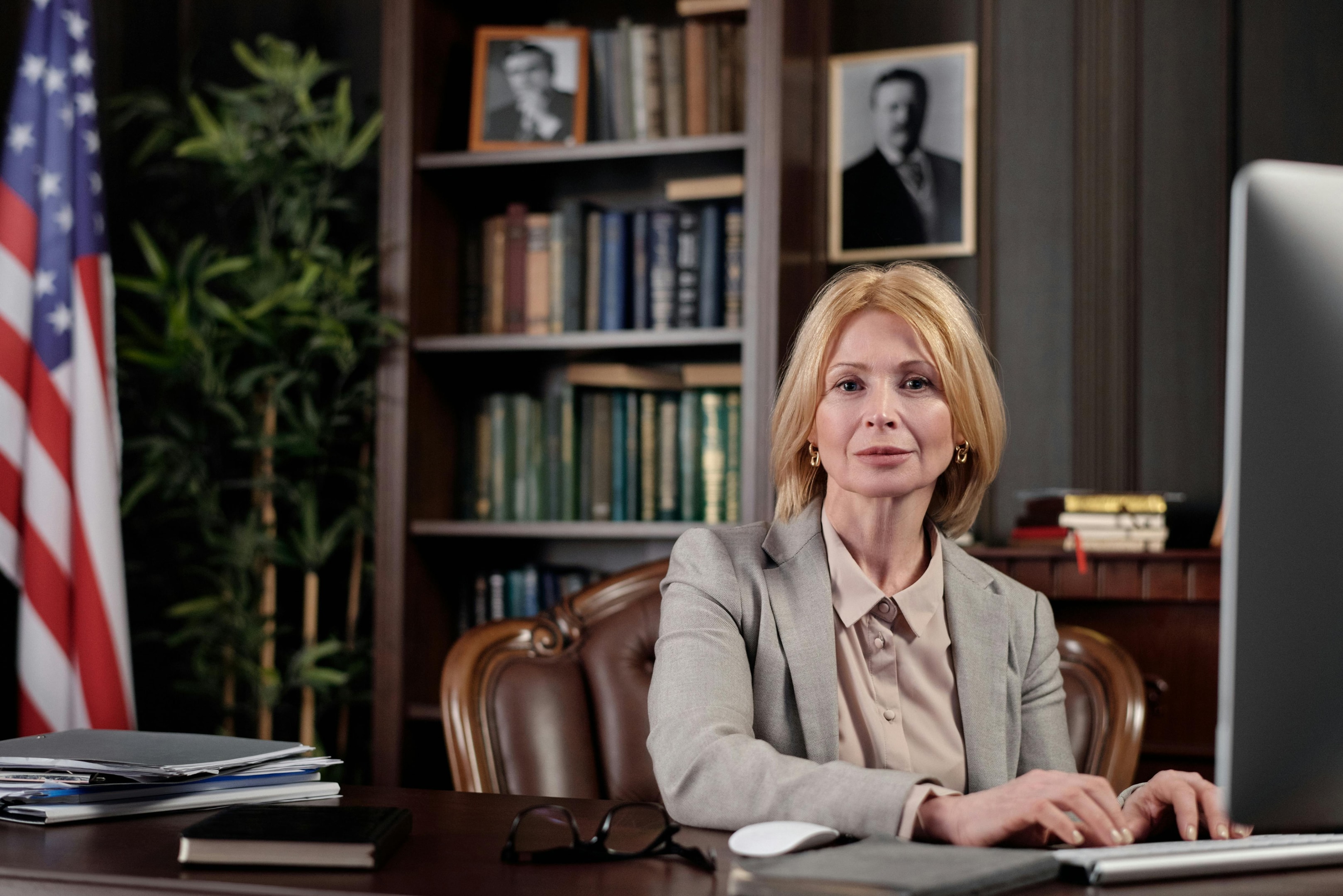Real estate attorney working in law office.