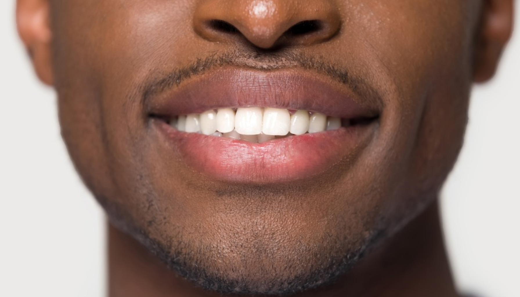 Tann: Mer Enn Bare Emalje – Bygget for Hele Livet 13 Nærbilde av smilende munn med sunne hvite tenner, viser god munnhygiene og naturlige lepper mot nøytral bakgrunn studio tann hull i tennene hull i tennene karies tannlege eller tannpleier tennene tenner hos tannlege tannen hos tannlege dersom bør andre behandling munn mer barn viktig ofte munnen tannkrem god mye tannlegen får under trenger gir våre betennelse gjerne gjør tilfeller tannkjøttet finnes ulike går regelmessig kommer flere ganger krone undersøkelse sykdom tidlig fjernes vanlig vann kontakt føre voksne fleste forebygge store behov tanntråd finner behandles drikke bruker mat periodontitt ekstra større nøye alder tar tannkjøttbetennelse hjelper lenger danner tid riktig hele spiser oral slike oslo hindre feste grunn