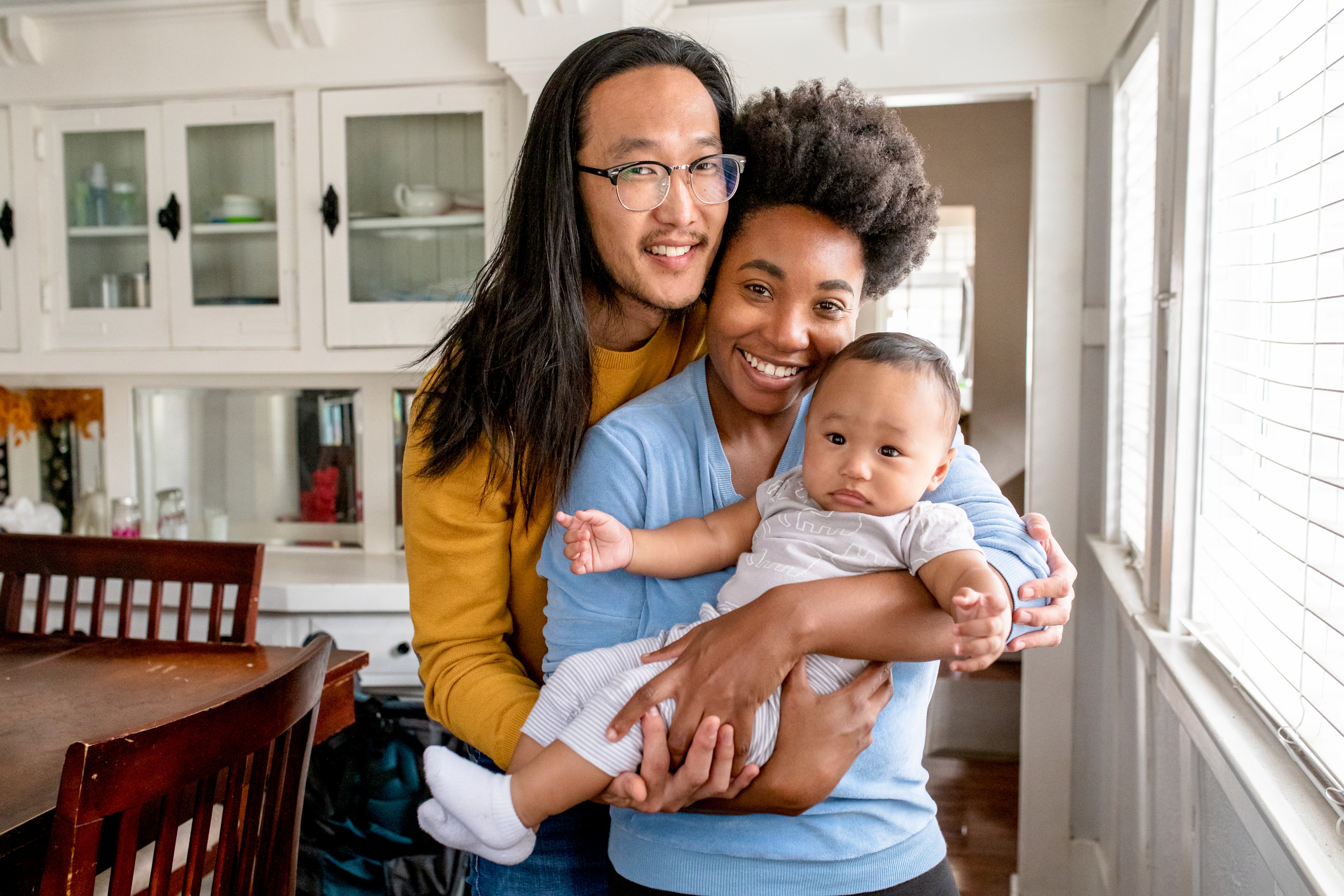 Manhattan parents in virtual couples therapy session addressing parenting conflicts from home.