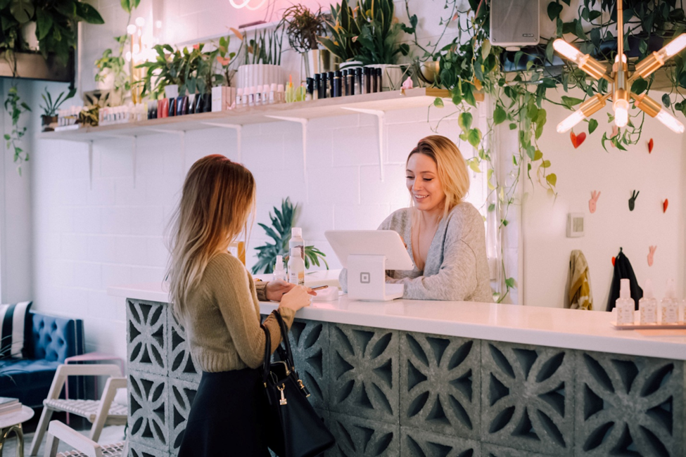 Photo of a girl negotiating in the counter