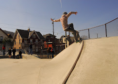 A skatepark with various features