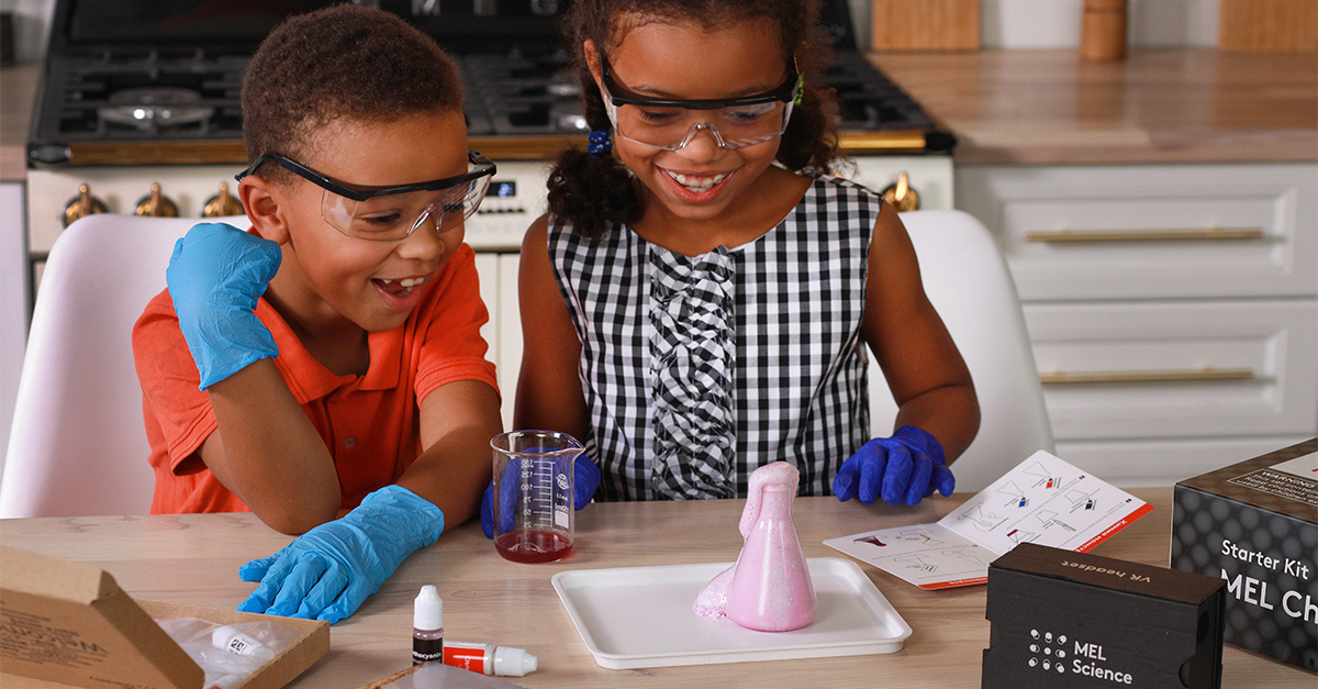 A hands-on science projects kit with experiments for 5th graders, including test tubes and lab equipment