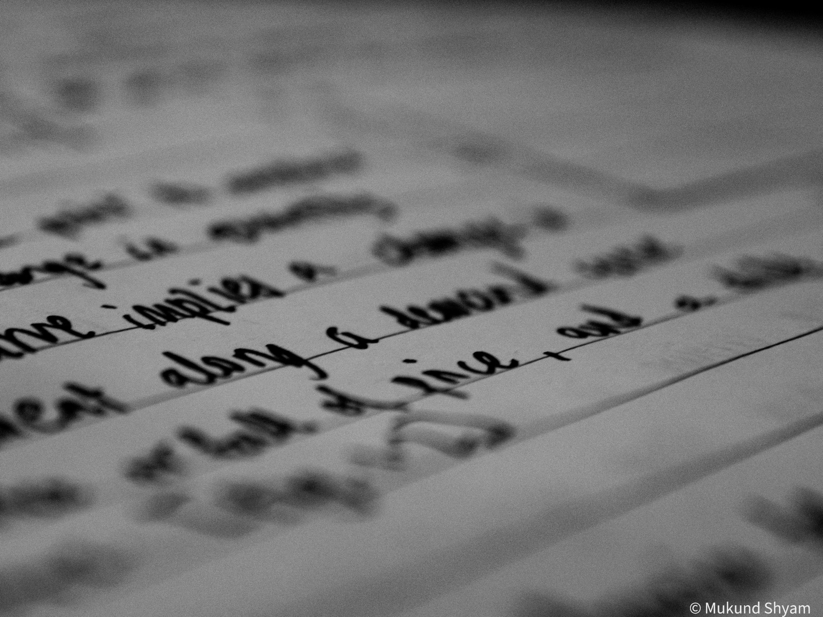 Handwriting on a real estate postcard.