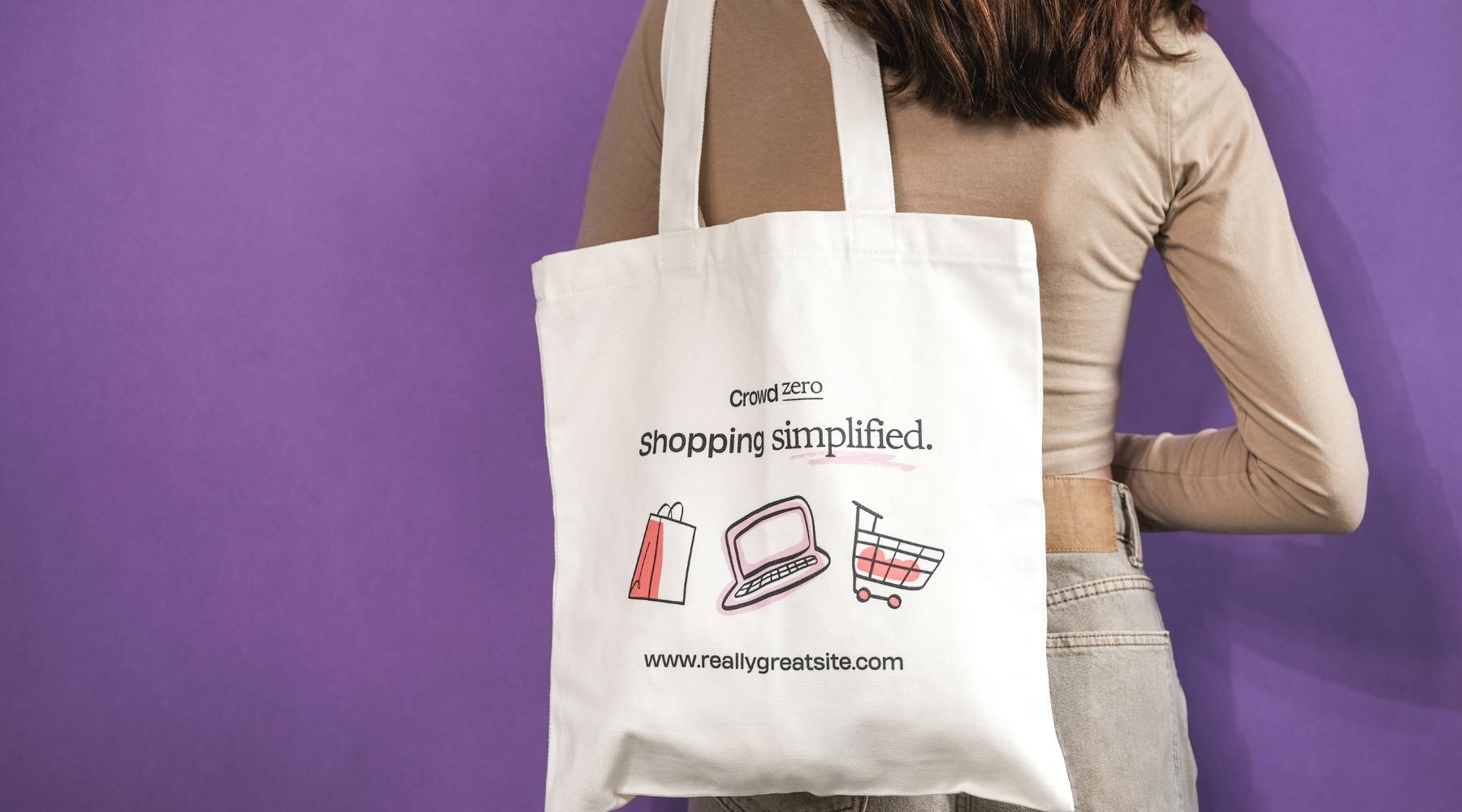 Woman in a purple background holding a white tote bag with 'Crowd Zero, shopping simplified' slogan.