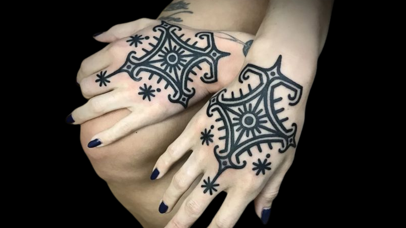 Bold ornamental hand tattoos by Fran Rocha.