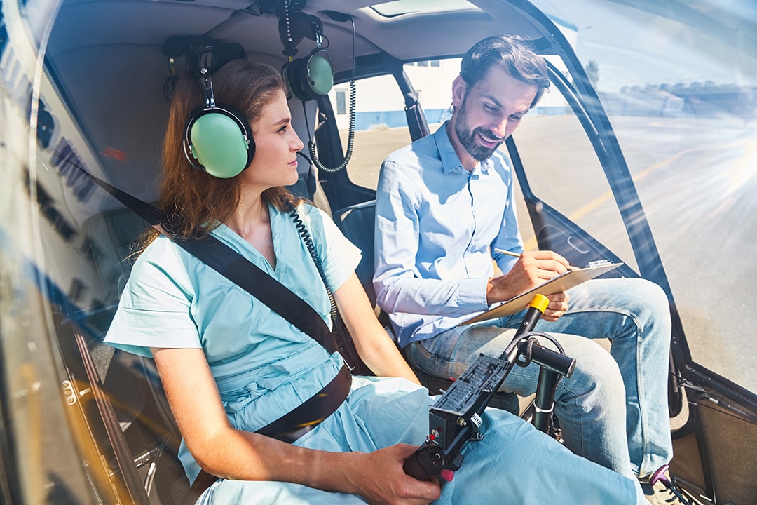 flight instructor guiding sport pilot student