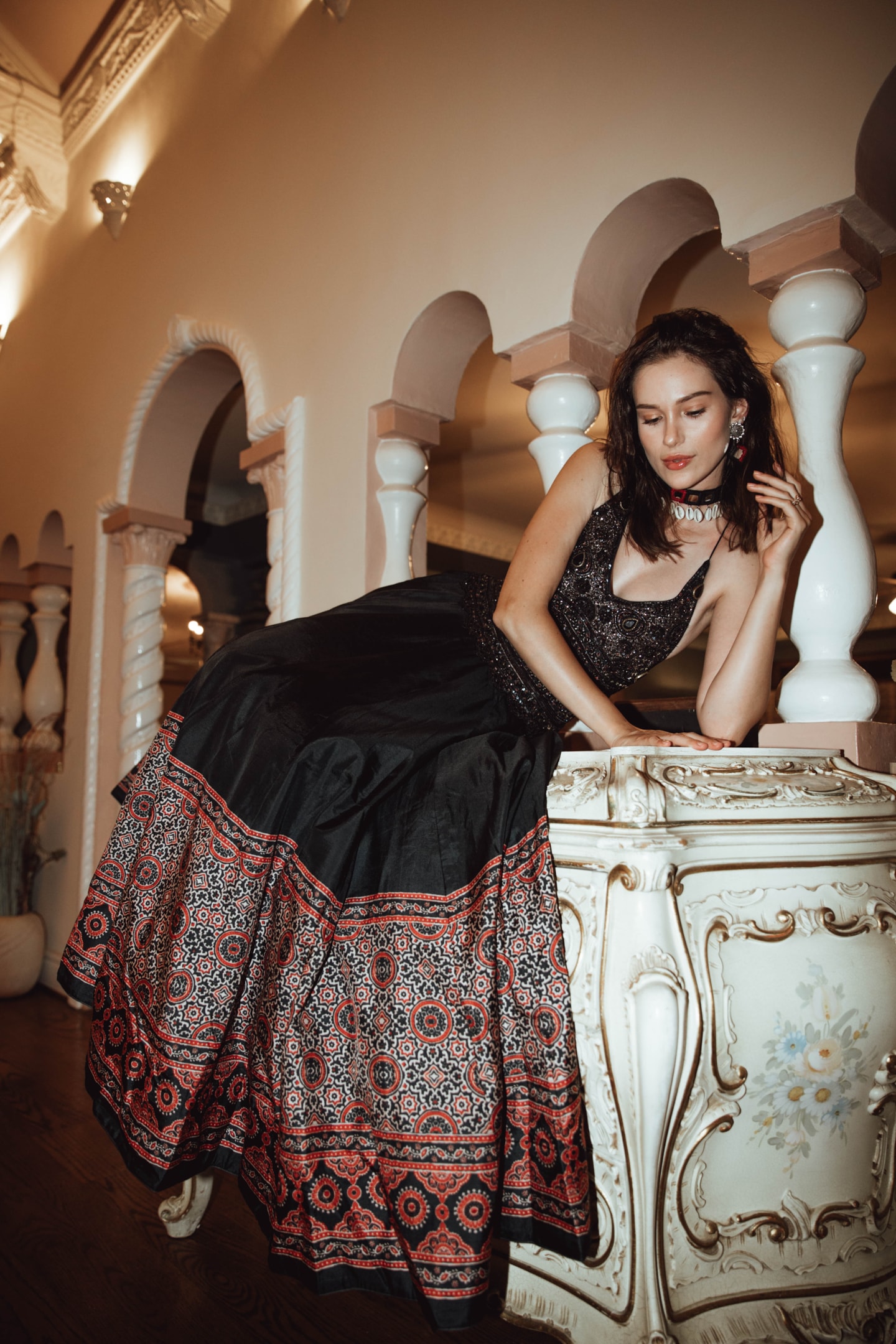 The image showcases a collection of elegant Indian gown