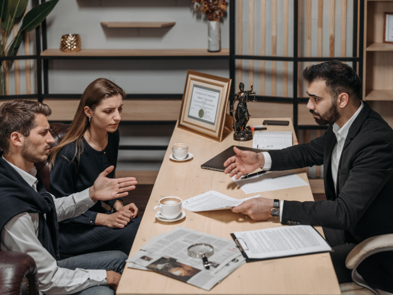 Image of a person talking with a lawyer afte a highway accident.