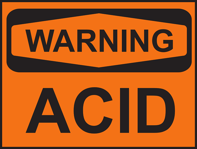 Image of acid warning related to pH